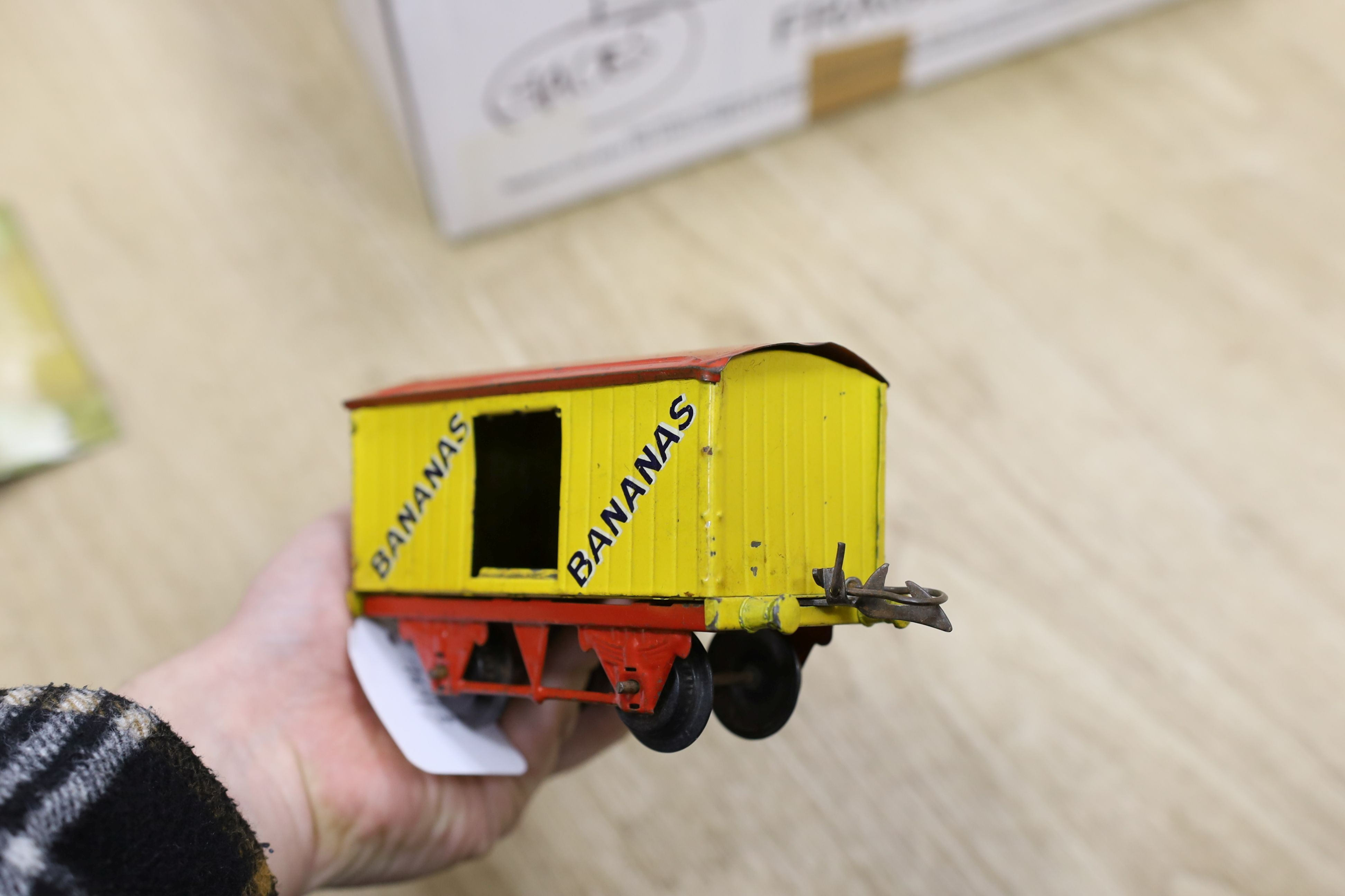 A mixed quantity of Hornby model railway track, a metal crossing, an engine and other items